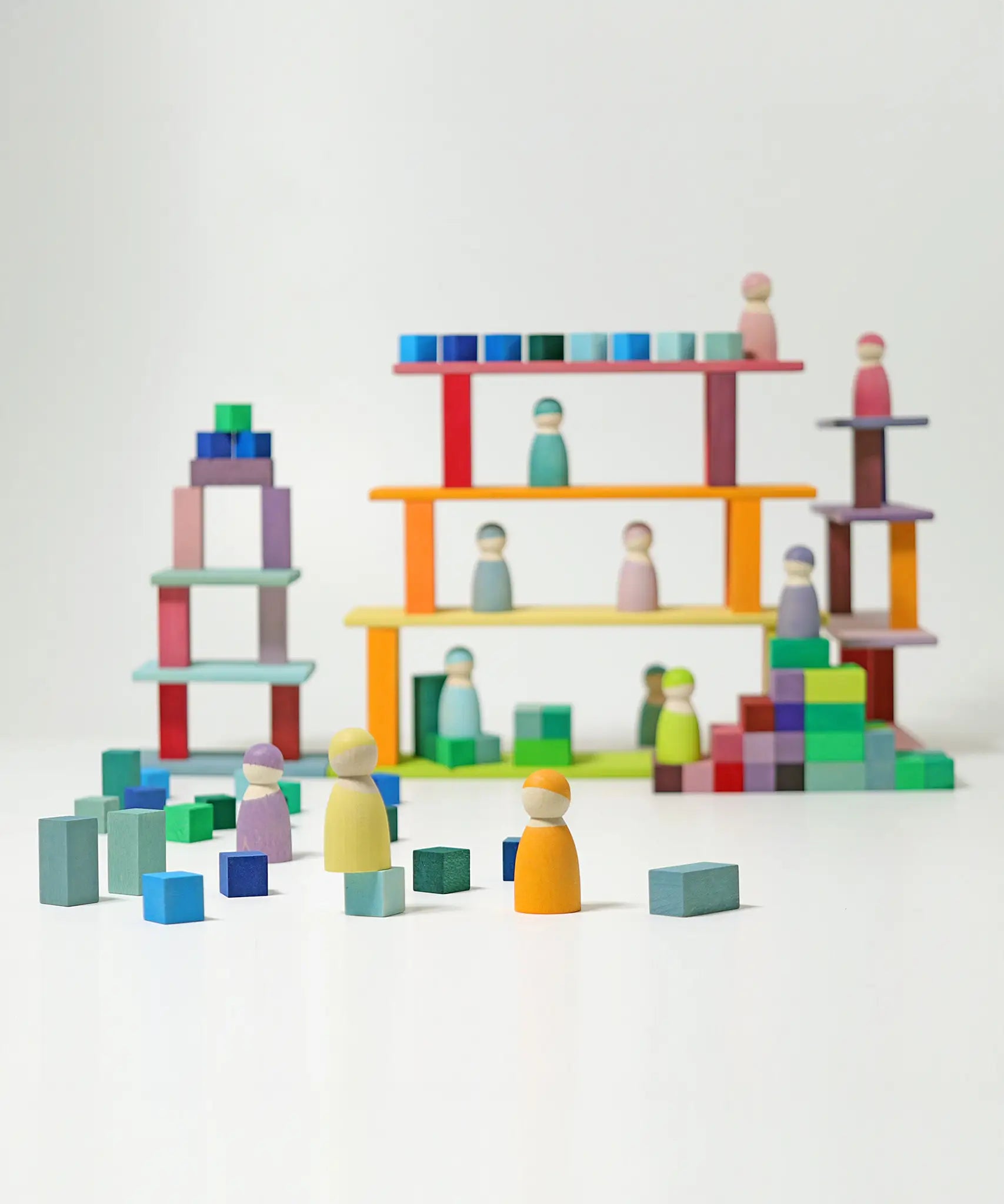 Grimm's Small Stepped Pyramid used to create a build with the Leonardo sticks with friends peg dolls placed on them.
