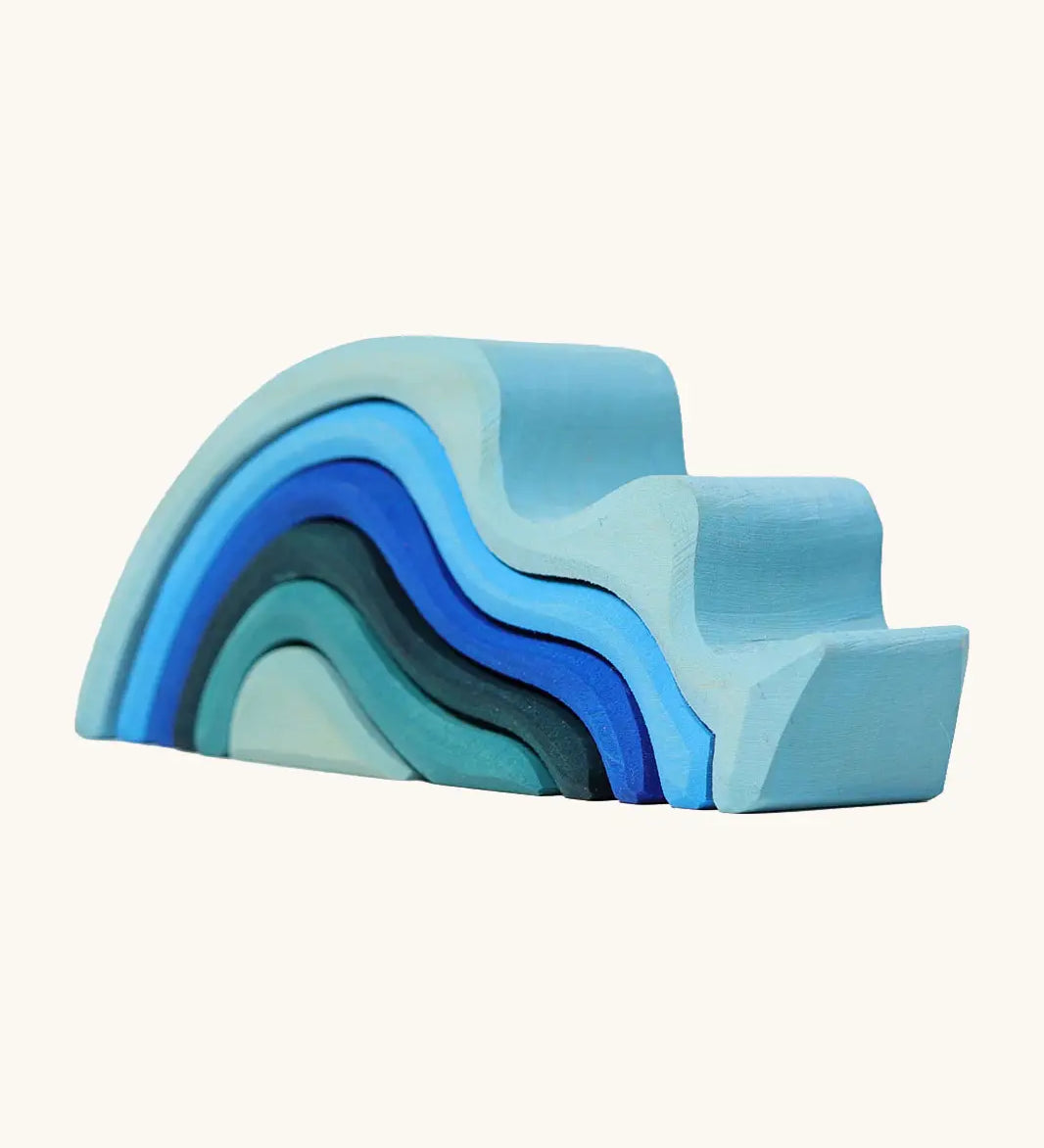 Grimms handcrafted wooden small water wave set in shades of blue. Perfect for stacking and open ended play