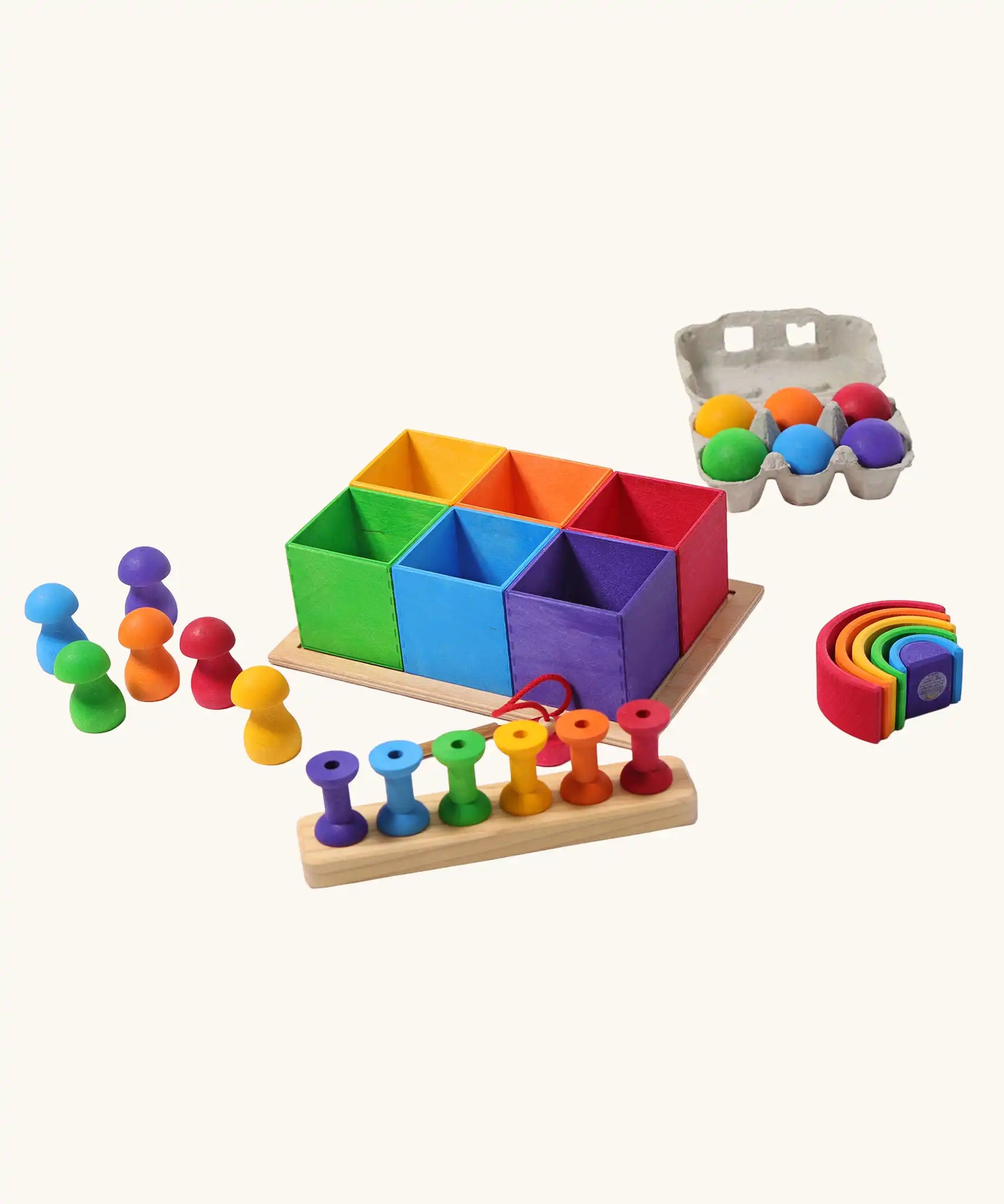 Grimm's small sorting helper wooden boxes 6 piece set with rainbow coloured toys.