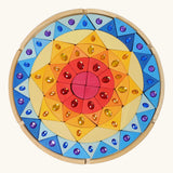 Grimms sparkling mandala set includes brightly coloured pieces in different shapes with jewels and circular frame