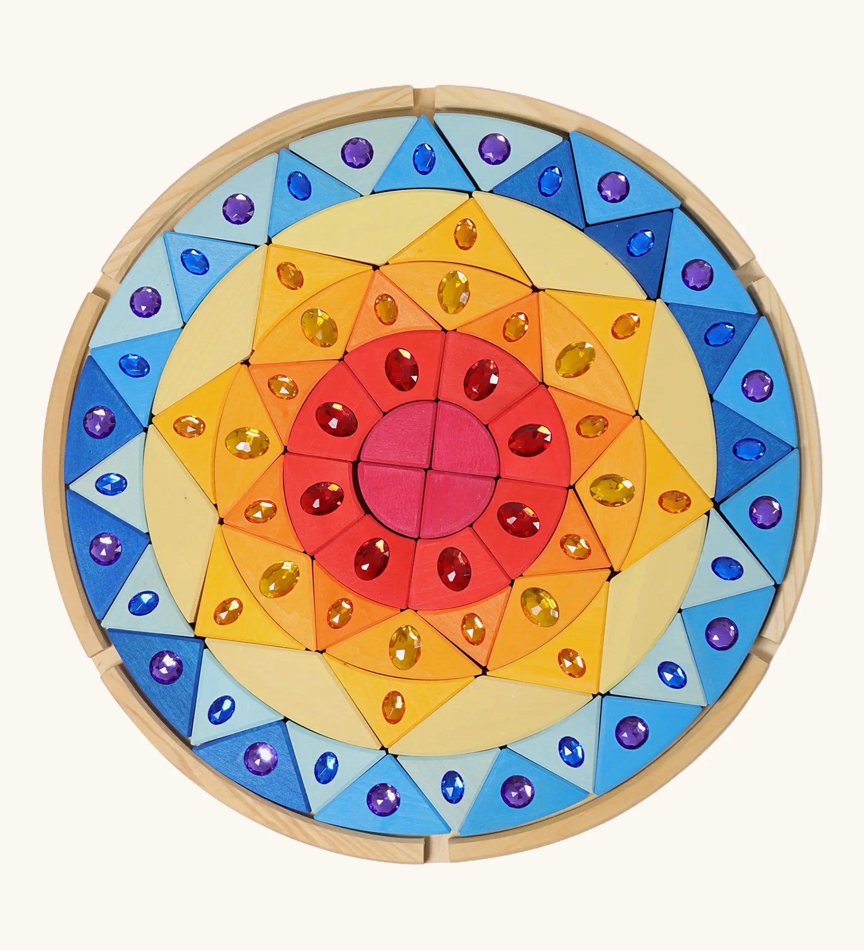 Grimms sparkling mandala set includes brightly coloured pieces in different shapes with jewels and circular frame