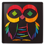 Grimm's colour spiral magnet puzzle used to create an owl.