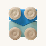 A set of two Grimm's blue wooden toy cars that can be stacked on top of each other. These Grimm's toys are part of a wide range of wooden toys available here at Babipur. 