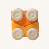 A set of two Grimm's orange wooden toy cars that can be stacked on top of each other. These Grimm's toys are part of a wide range of wooden toys available here at Babipur. 