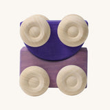 A set of two Grimm's purple wooden toy cars that can be stacked on top of each other. These Grimm's toys are part of a wide range of wooden toys available here at Babipur. 