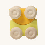 A set of two Grimm's yellow wooden toy cars that can be stacked on top of each other. These Grimm's toys are part of a wide range of wooden toys available here at Babipur. 