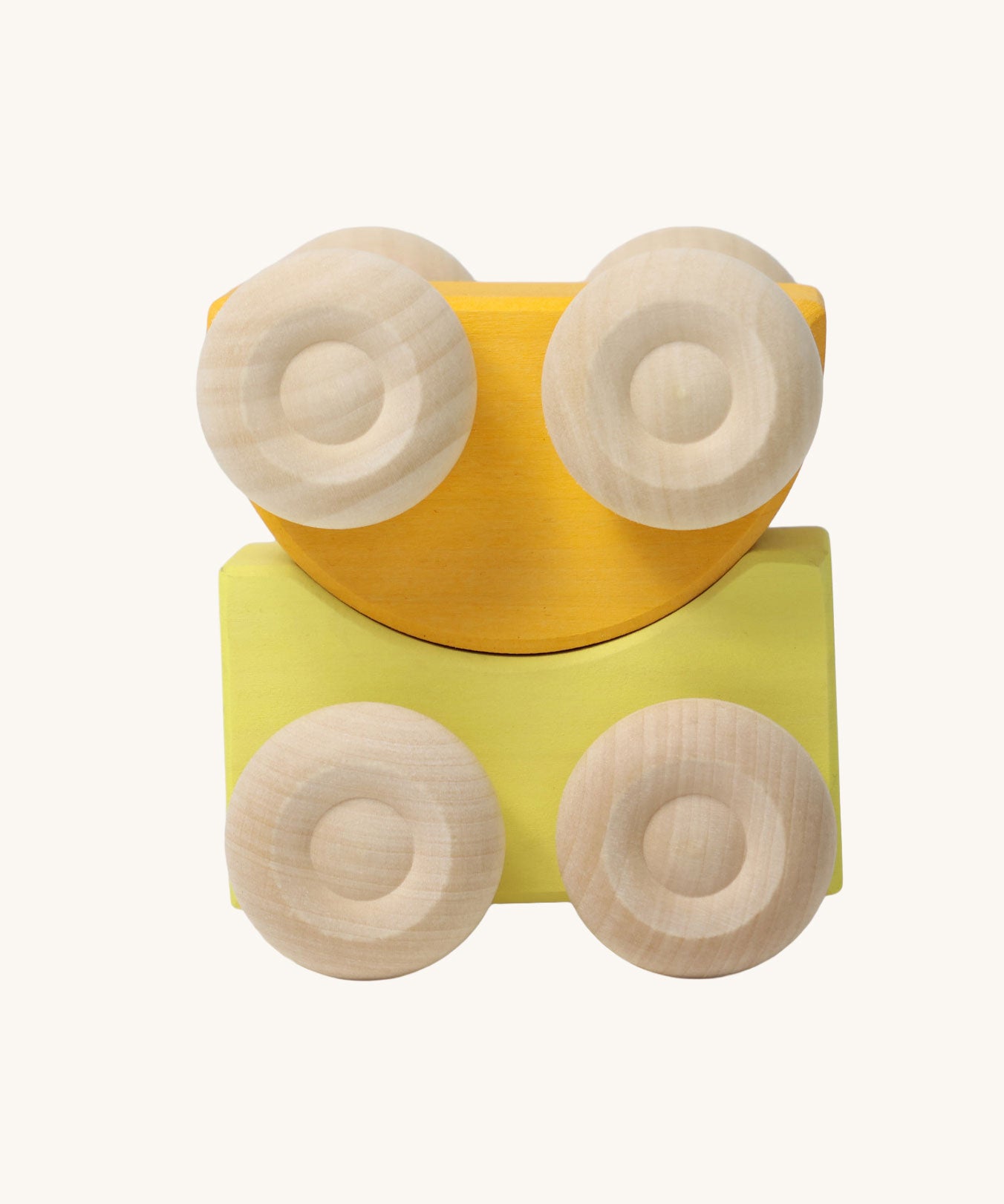 A set of two Grimm's yellow wooden toy cars that can be stacked on top of each other. These Grimm's toys are part of a wide range of wooden toys available here at Babipur. 