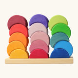 Back of Grimms stacking moon shape houses standing on the tray