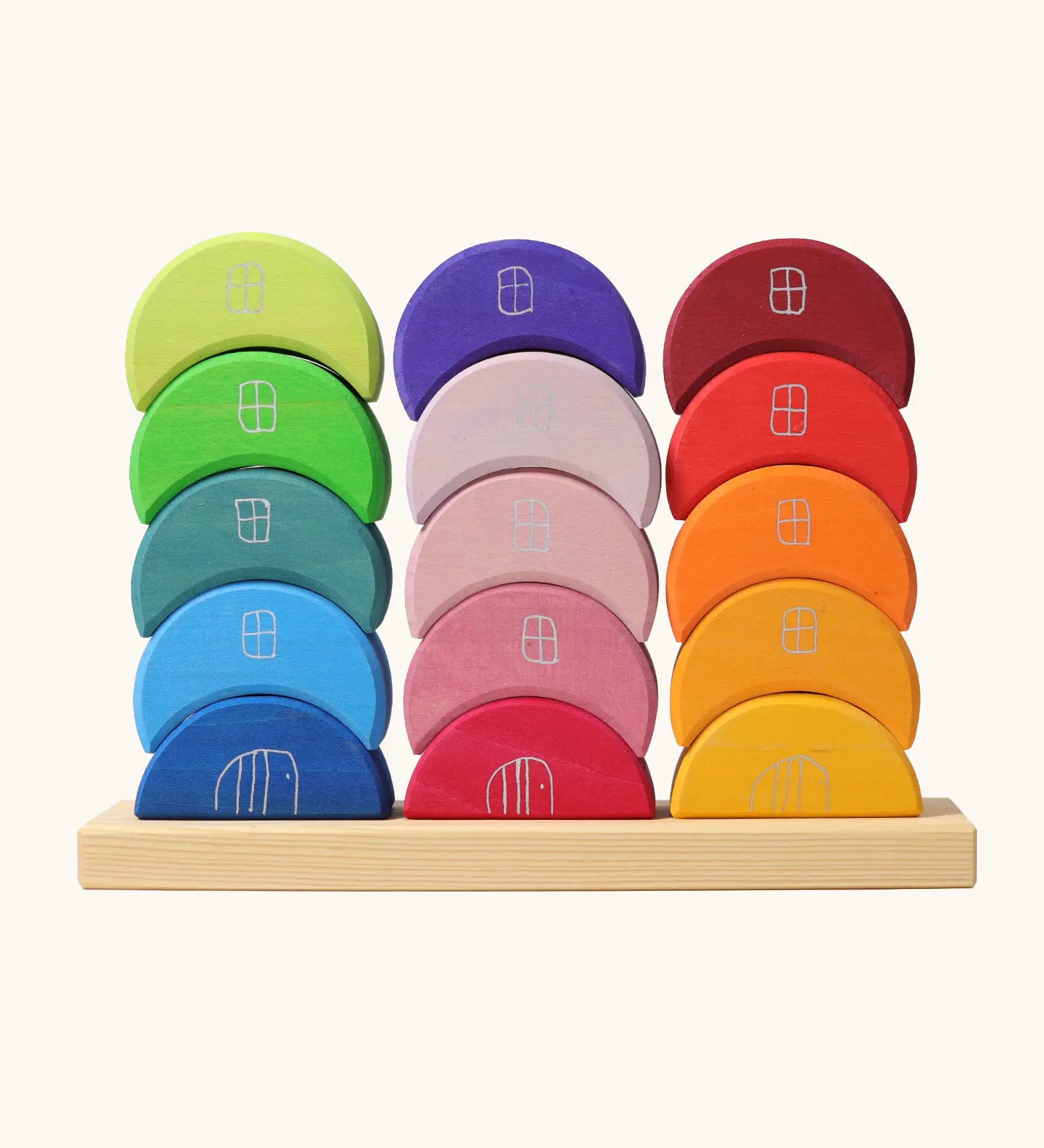 Grimms stacking moon shapes houses. Contains 15 handcrafted wooden crescent shaped blocks with a decorative window and door on the front