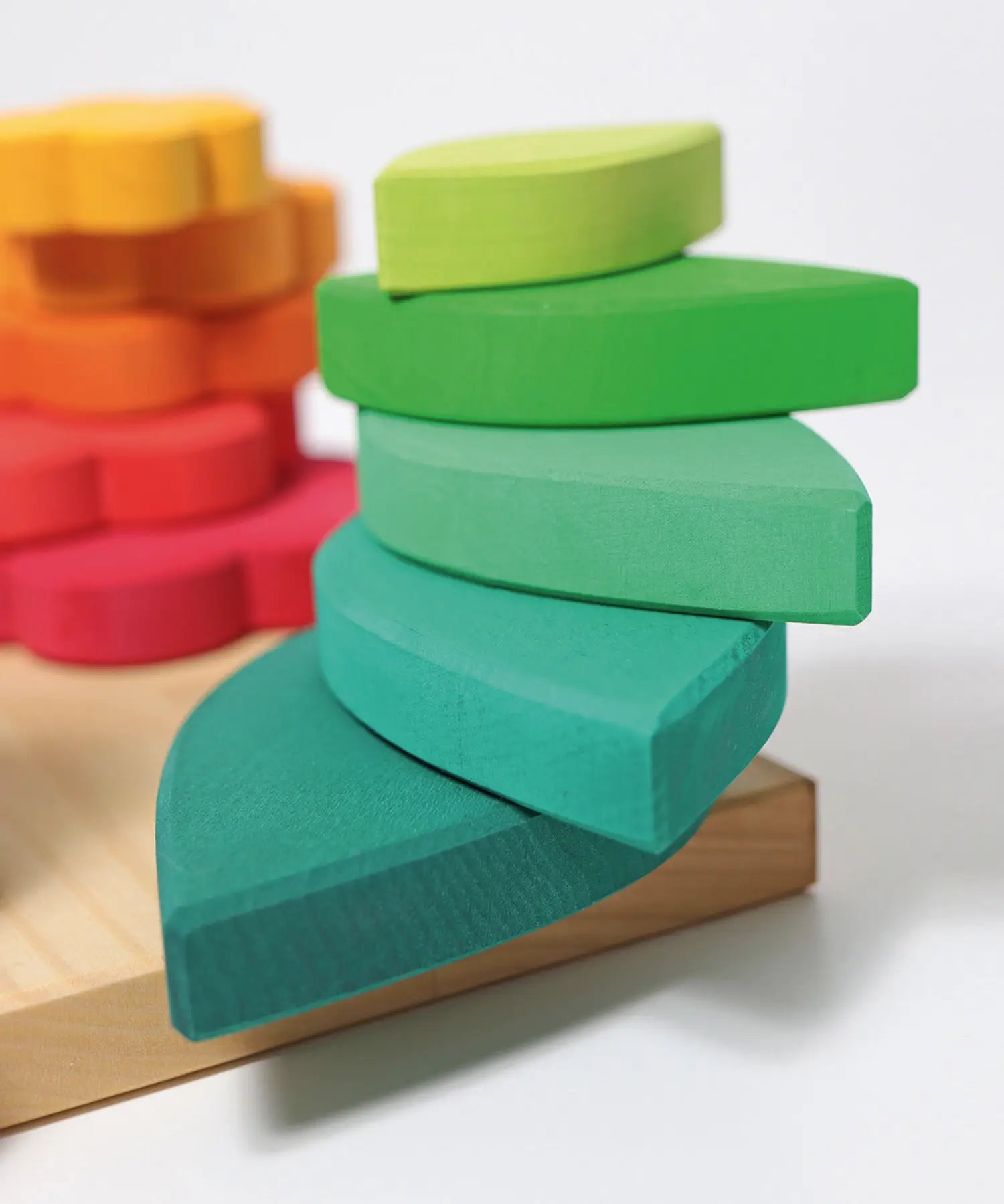 Grimms handcrafted wooden tower showing a close up of the grain detail on the leaf shaped pieces