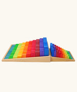 Grimm's small stepped counting blocks in a tray placed besides the larger version.