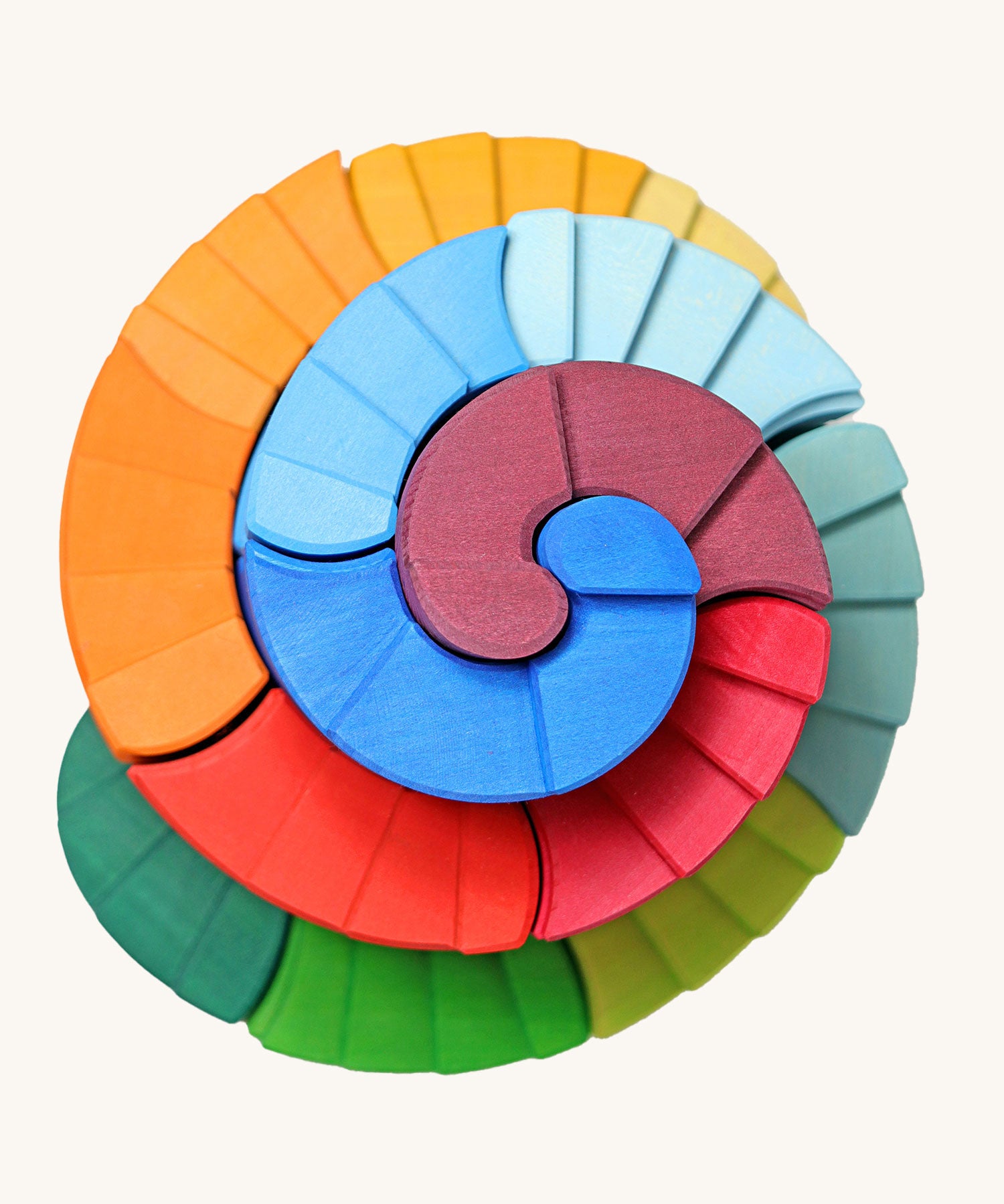 A view from directly above of the Grimm's Counter-Rotating Stepped Spiral wooden block set. 