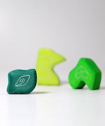 Pieces of the Grimm's tower leaves wooden stacking blocks set.