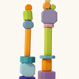 Grimm's tree slices wooden coloured building blocks. 