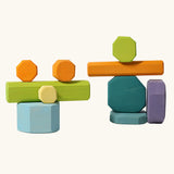 Grimm's tree slices wooden coloured building blocks. 