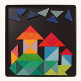 A castle made from the Grimm's bright wooden triangular magnetic pieces displayed in a tin 