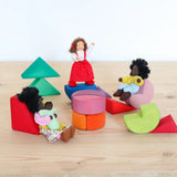 Grimms triangle, square and circle wooden blocks loose with waldorf dolls sitting on top