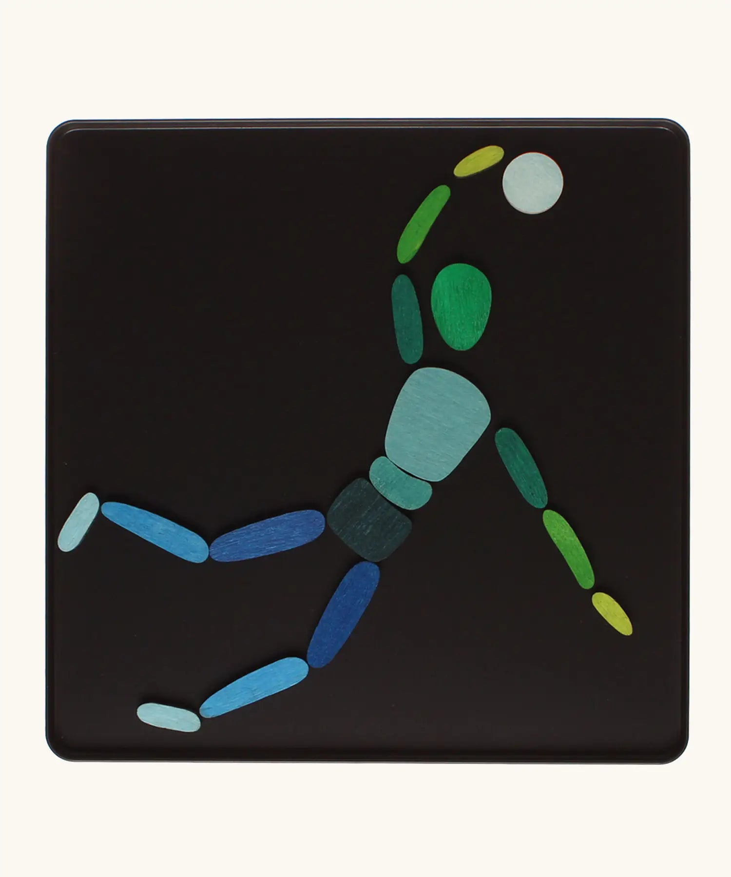 A basketball player made from the Grimm's bright wooden two bodies magnetic pieces displayed in a tin 