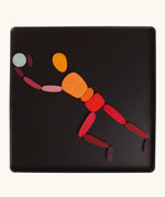 A goalkeeper made from the Grimm's bright wooden two bodies magnetic pieces displayed in a tin 