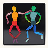 Grimms two bodies magnet puzzle set. Includes 32 plywood magnetic pieces in bright colours and a storage tin