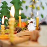 A cosy Winter inspired display using  Grimm's Waldorf Celebration Rings, Grimm's Candles and Ambrosius dolls available at Babipur