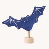 A Grimm's bat wooden decorative figure for celebration rings. 