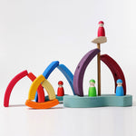 A small world play scene set up using the pieces from the Grimm's Stacking Tower Boat Set and some Grimm's friends. 
