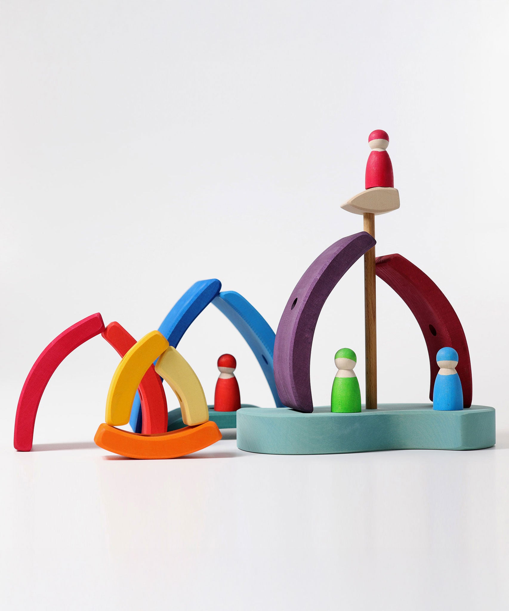 A small world play scene set up using the pieces from the Grimm's Stacking Tower Boat Set and some Grimm's friends. 