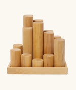 Grimm's large wooden building rollers in natural in a tray.