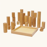 Grimm's large wooden building rollers in natural next to the tray.