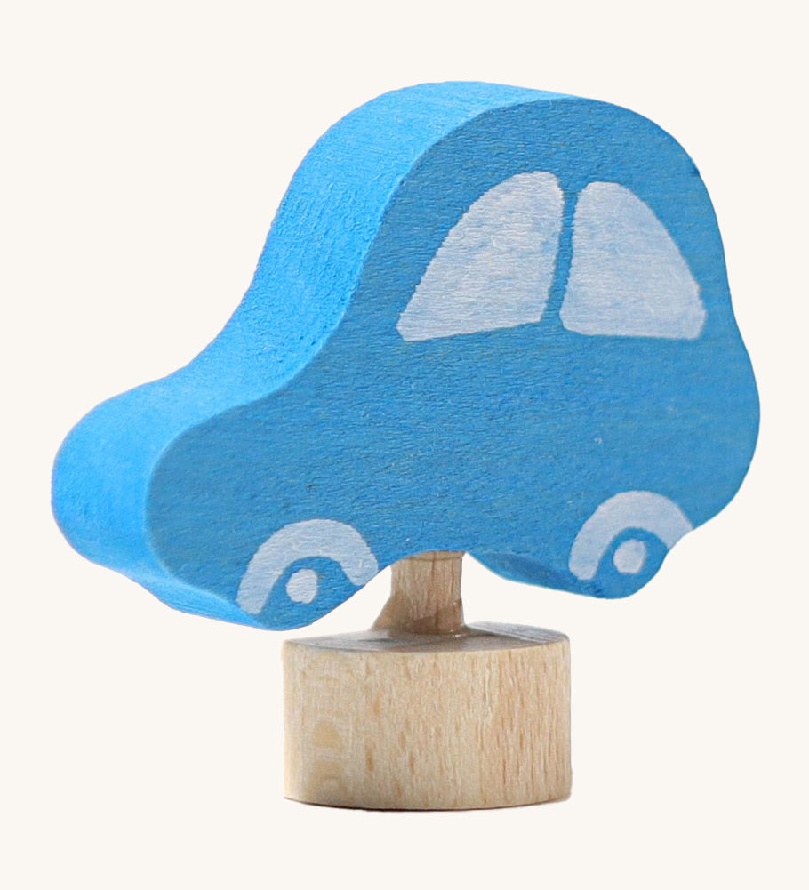 Side view of the Grimms wooden blue car decorative figure. Showing the thickness of the figure and paint detail 