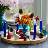 A Winter inspired display using a Grimm's Waldorf Celebration Ring, Grimm's decorative figures, Grimm's Candles and Ambrosius dolls available at Babipur