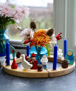 A Winter inspired display using a Grimm's Waldorf Celebration Ring, Grimm's decorative figures, Grimm's Candles and Ambrosius dolls available at Babipur
