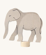 Grimms wooden elephant decorative figure with a hand painted finish and a small base stand to slot in a celebration ring