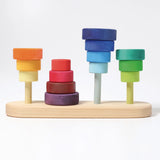 GRimms wooden fabuto set showing the disks stacked upright and inverted on the base 