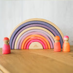 Tower toys and Neon friends are used together to make a play scene.