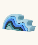 Grimms handcrafted wooden large water wave set in shades of blue. Perfect for stacking and open ended play