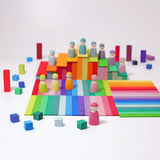 A simple play setup using the Grimms Leonardo sticks, peg dolls and small cube blocks