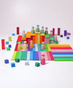 A simple play setup using the Grimms Leonardo sticks, peg dolls and small cube blocks