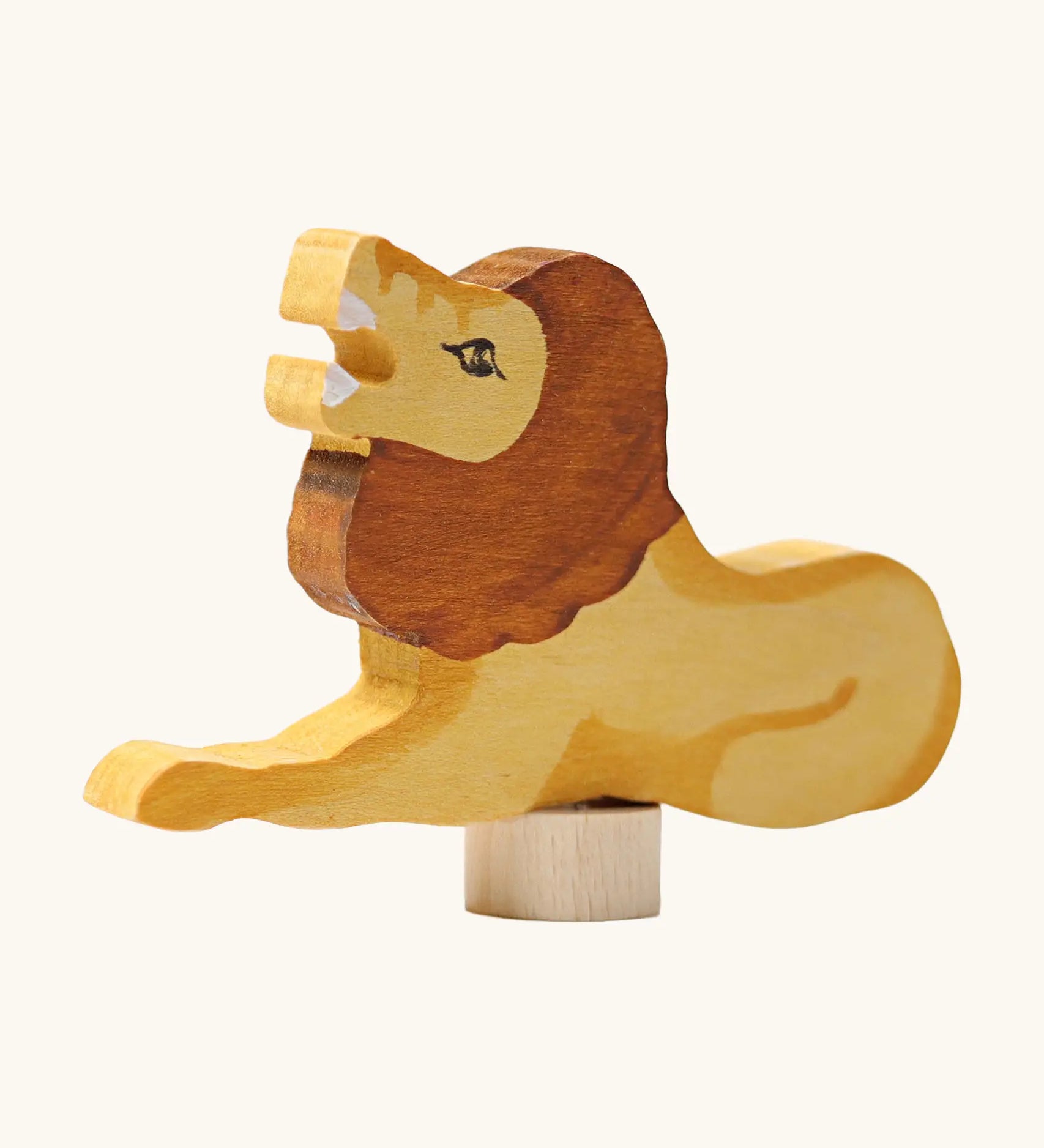 Front of Grimm's handcrafted wooden roaring lion decorative figure showing hand painted detail