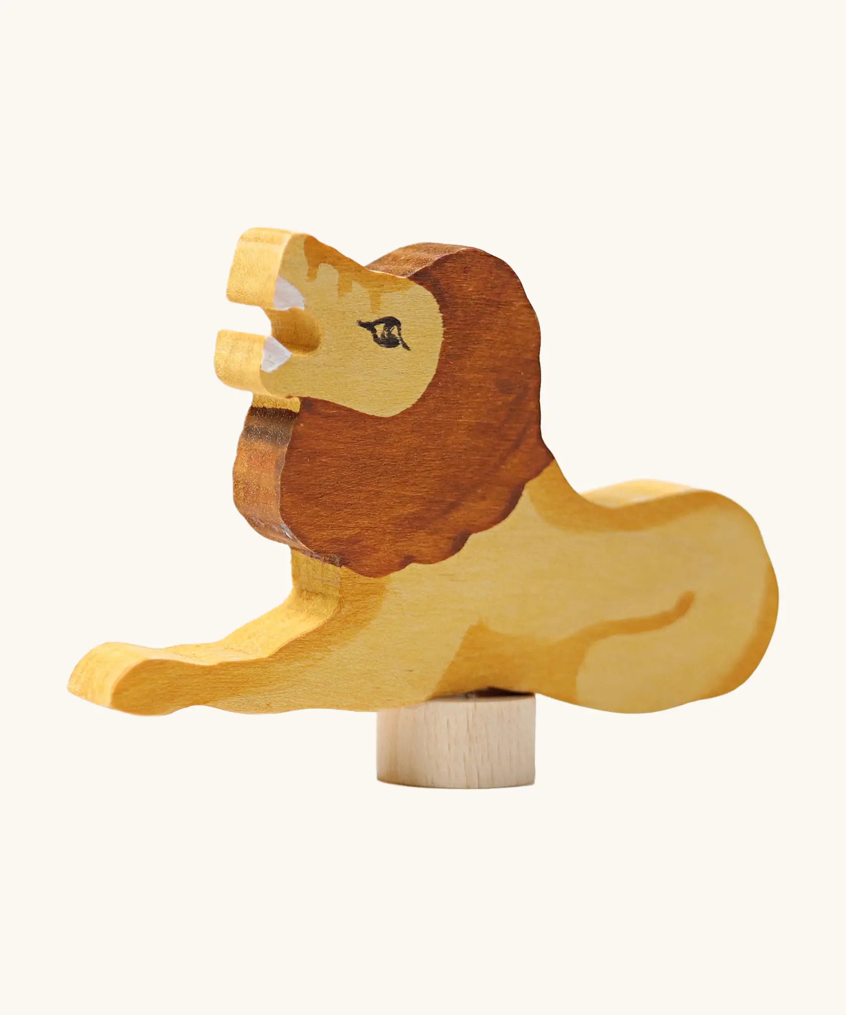 Front of Grimm's handcrafted wooden roaring lion decorative figure showing hand painted detail