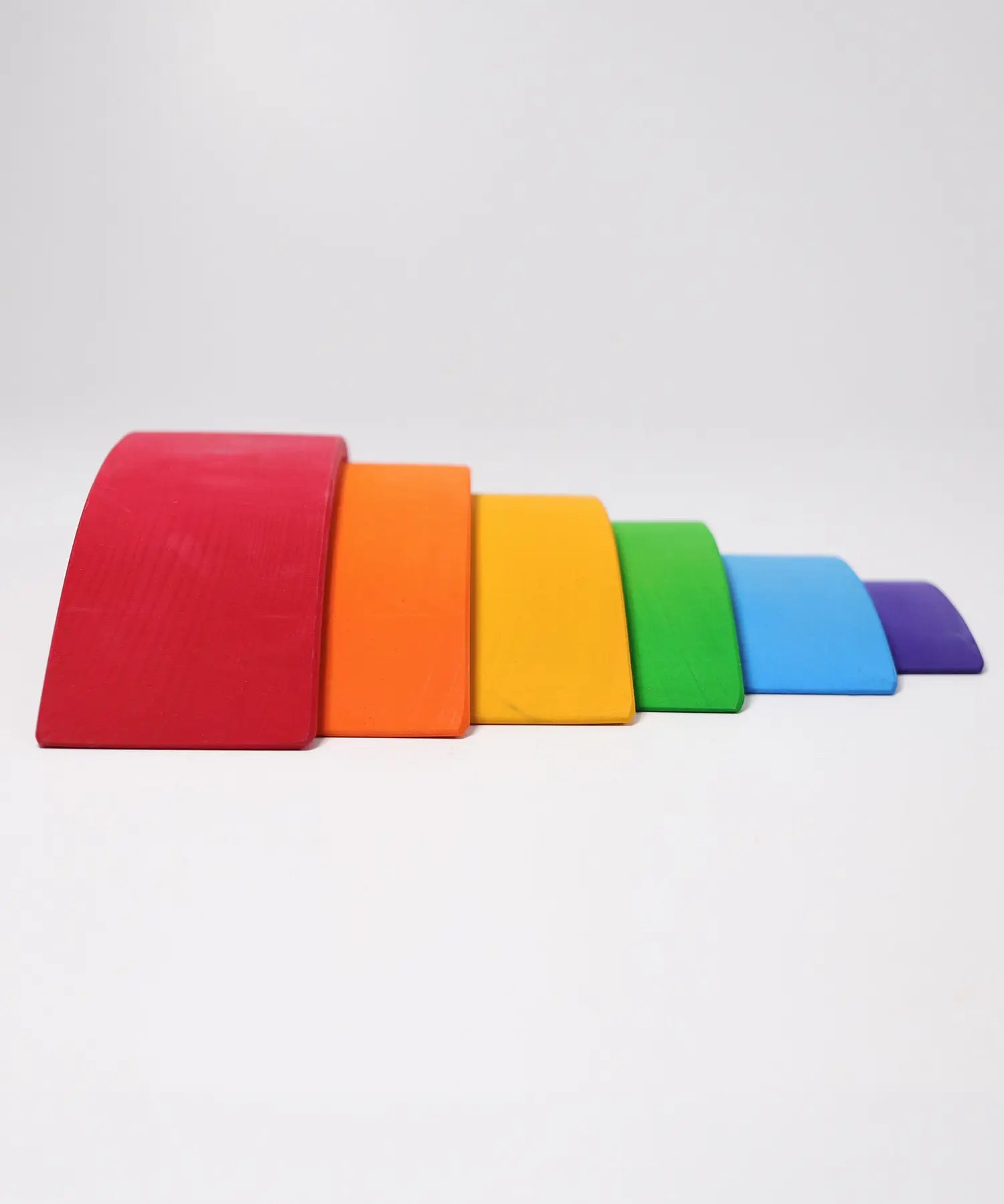Side of Grimms handcrafted wooden rainbow bridges showing each pieces slotted into eachother