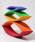 A stack using Grimm's handcrafted wooden rainbow bridges 