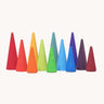 A set of tall and short Grimms wooden forest pieces in a rainbow palette. Made  for open ended play and learning