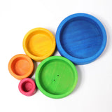 Overhead view of loose Grimms brightly coloured wooden sorting bowls 