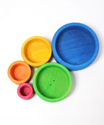 Overhead view of loose Grimms brightly coloured wooden sorting bowls 
