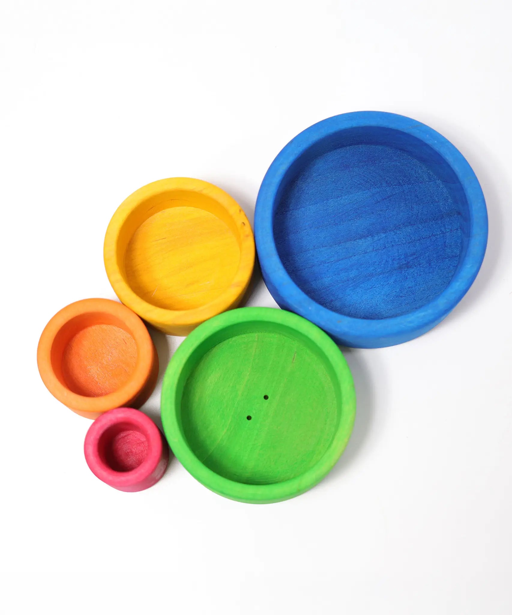 Overhead view of loose Grimms brightly coloured wooden sorting bowls 