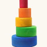 A stack of Grimms brightly coloured  wooden sorting bowls