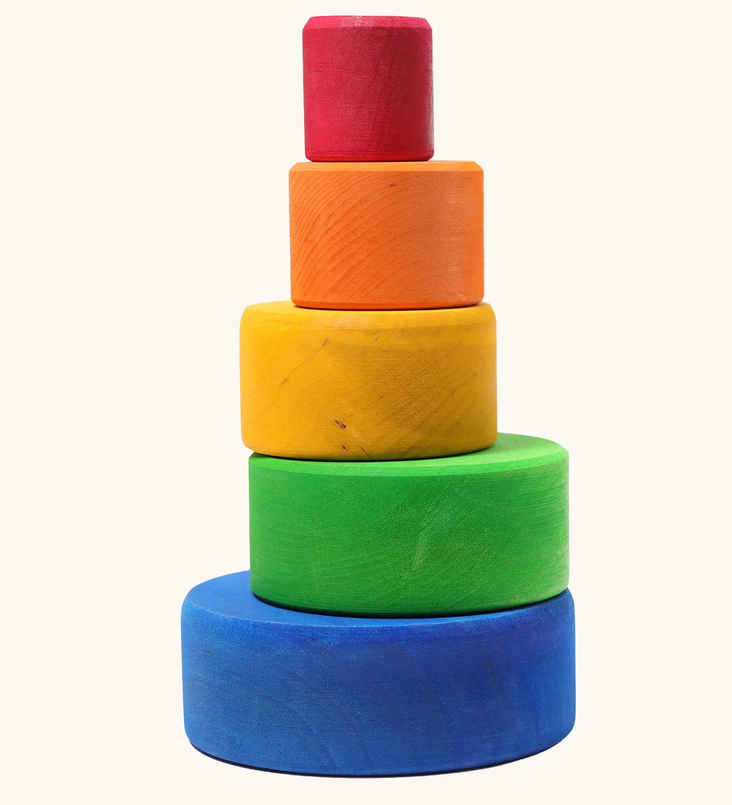 A stack of Grimms brightly coloured  wooden sorting bowls