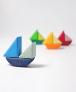 4 little sailboats made from the Grimms handcrafted wooden rolling boats pieces